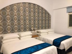 Katil atau katil-katil dalam bilik di Cicada said Greece Homestay
