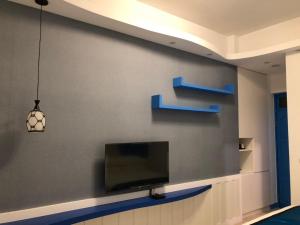 TV o dispositivi per l'intrattenimento presso Cicada said Greece Homestay