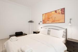 Posteľ alebo postele v izbe v ubytovaní Central Park View Apartment