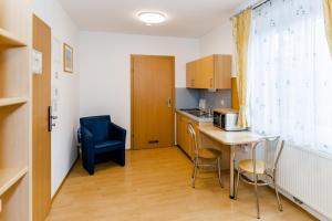Kuchnia lub aneks kuchenny w obiekcie Appartement Graz - Ihr erstklassiges Zuhause fernab von Zuhause