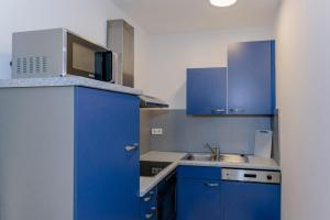 Kuchnia lub aneks kuchenny w obiekcie Appartement Graz - Ihr erstklassiges Zuhause fernab von Zuhause