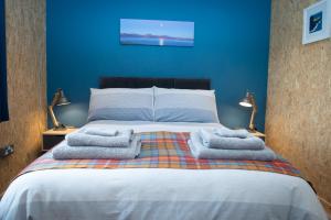 Tempat tidur dalam kamar di Lochanside