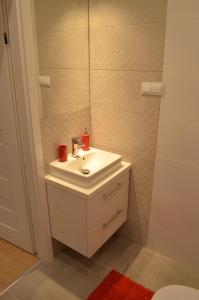 Kúpeľňa v ubytovaní Apartament SZTOKHOLM + 28 fotografií