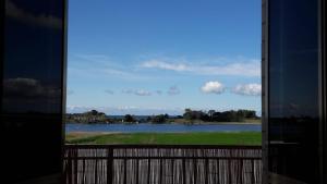 a view of a lake from a window at Casa Noemi in Sperlonga
