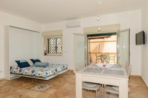 Posteľ alebo postele v izbe v ubytovaní Sunset Holiday Home Taormina