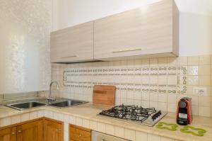Kuchyňa alebo kuchynka v ubytovaní Sunset Holiday Home Taormina