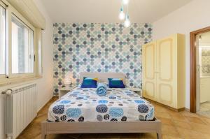 Posteľ alebo postele v izbe v ubytovaní Sunset Holiday Home Taormina