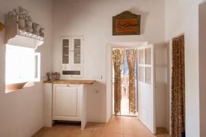 A kitchen or kitchenette at Can Toni Platera