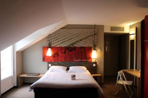 Letto o letti in una camera di ibis Montargis
