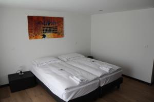Postel nebo postele na pokoji v ubytování Chalet Felderhof