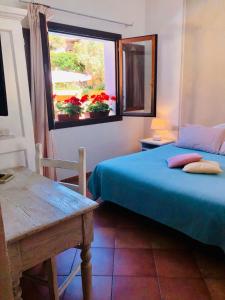 Rúm í herbergi á Boutique Hotel Sant'Andrea & Relais