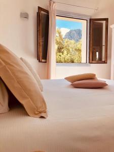 Rúm í herbergi á Boutique Hotel Sant'Andrea & Relais