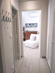 A bed or beds in a room at La Casetta - Near the sea & free parking