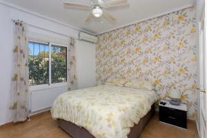 Posteľ alebo postele v izbe v ubytovaní CH Villa Costablanca Ciudad Quesada
