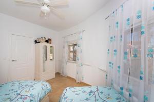 Posteľ alebo postele v izbe v ubytovaní CH Villa Costablanca Ciudad Quesada