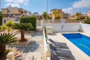 Bazén v ubytovaní CH Villa Costablanca Ciudad Quesada alebo v jeho blízkosti
