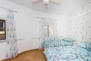 Posteľ alebo postele v izbe v ubytovaní CH Villa Costablanca Ciudad Quesada