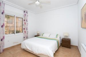Posteľ alebo postele v izbe v ubytovaní CH Villa Costablanca Ciudad Quesada
