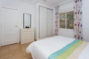 Posteľ alebo postele v izbe v ubytovaní CH Villa Costablanca Ciudad Quesada