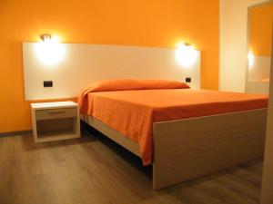 Posteľ alebo postele v izbe v ubytovaní Hotel Ogliastra