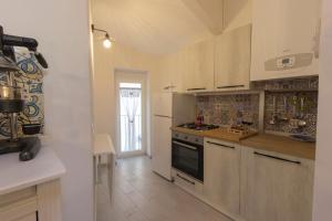 Kuchyňa alebo kuchynka v ubytovaní Il sentiero dell'Itria