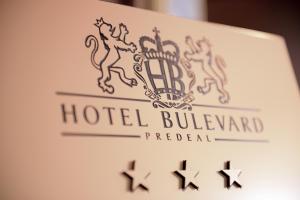 a sign for a hotel bulvenandanoricaloricalorical at Hotel Bulevard Predeal in Predeal