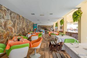 En restaurant eller et andet spisested på Holiday Club Sol Amadores