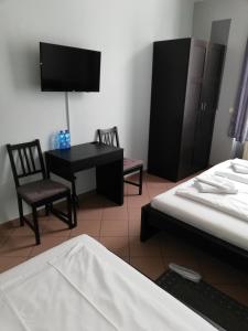 Postel nebo postele na pokoji v ubytování Angel Hotel