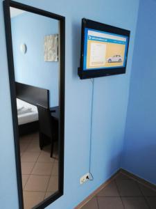 Postel nebo postele na pokoji v ubytování Angel Hotel