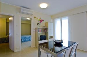 Telewizja i/lub zestaw kina domowego w obiekcie City Residence