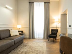 A seating area at Holidays Suites Navona