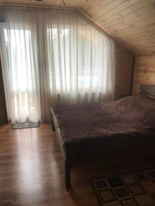 Postel nebo postele na pokoji v ubytování Hirska Kazka