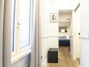 A bed or beds in a room at Holidays Suites Navona