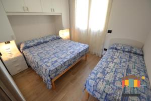 Postel nebo postele na pokoji v ubytování Al Parco 2