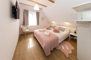 Katil atau katil-katil dalam bilik di Plitvice Retreat Apartments
