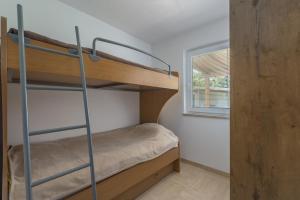 Postel nebo postele na pokoji v ubytování Holiday Home Jakob