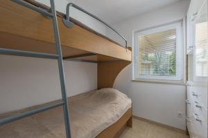 Postel nebo postele na pokoji v ubytování Holiday Home Jakob