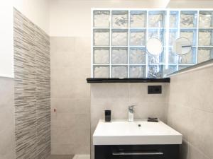Vannituba majutusasutuses Gemini Suites Navona