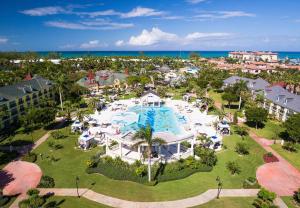 an aerial view of a resort with a swimming pool at Beaches Turks and Caicos Resort Villages and Spa All Inclusive in Providenciales