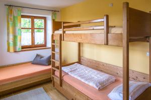 Postel nebo postele na pokoji v ubytování Balsnhof