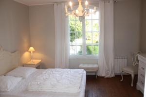 Postel nebo postele na pokoji v ubytování Maison Cornic