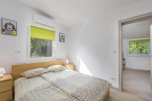 Postel nebo postele na pokoji v ubytování Holiday Home Jakob