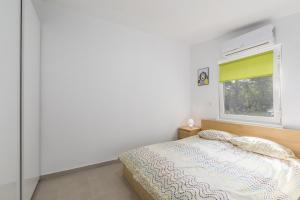Postel nebo postele na pokoji v ubytování Holiday Home Jakob