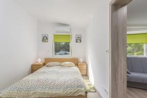Postel nebo postele na pokoji v ubytování Holiday Home Jakob