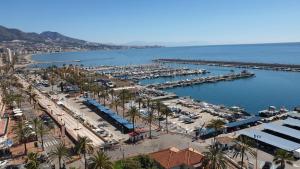 an aerial view of a harbor with a marina at ESTUDIO SOLYPLAYARELAX in Fuengirola