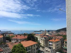 a view of a city with buildings and the ocean at Apartment Marija in Split