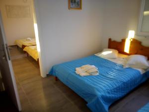 Letto o letti in una camera di Hotel Perissa
