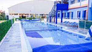 Bazén v ubytovaní Villaggio Hemingway - Family Aparthotel alebo v jeho blízkosti