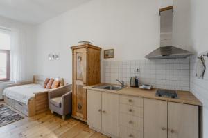 Postel nebo postele na pokoji v ubytování Apartmán 3, Suvorovova 158