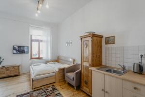 Postel nebo postele na pokoji v ubytování Apartmán 3, Suvorovova 158